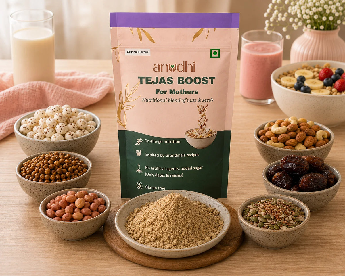 Anodhi Tejas Boost package for mothers with various nuts and seeds on a wooden table.