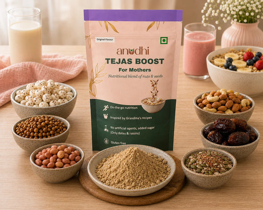Anodhi Tejas Boost package for mothers with various nuts and seeds on a wooden table.